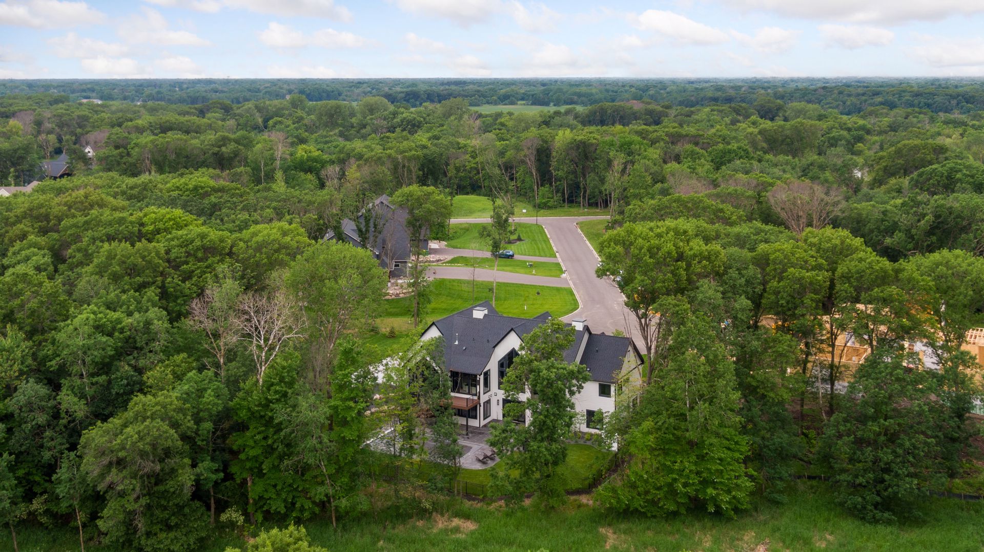 Aerial view of home on 3.35 private acres